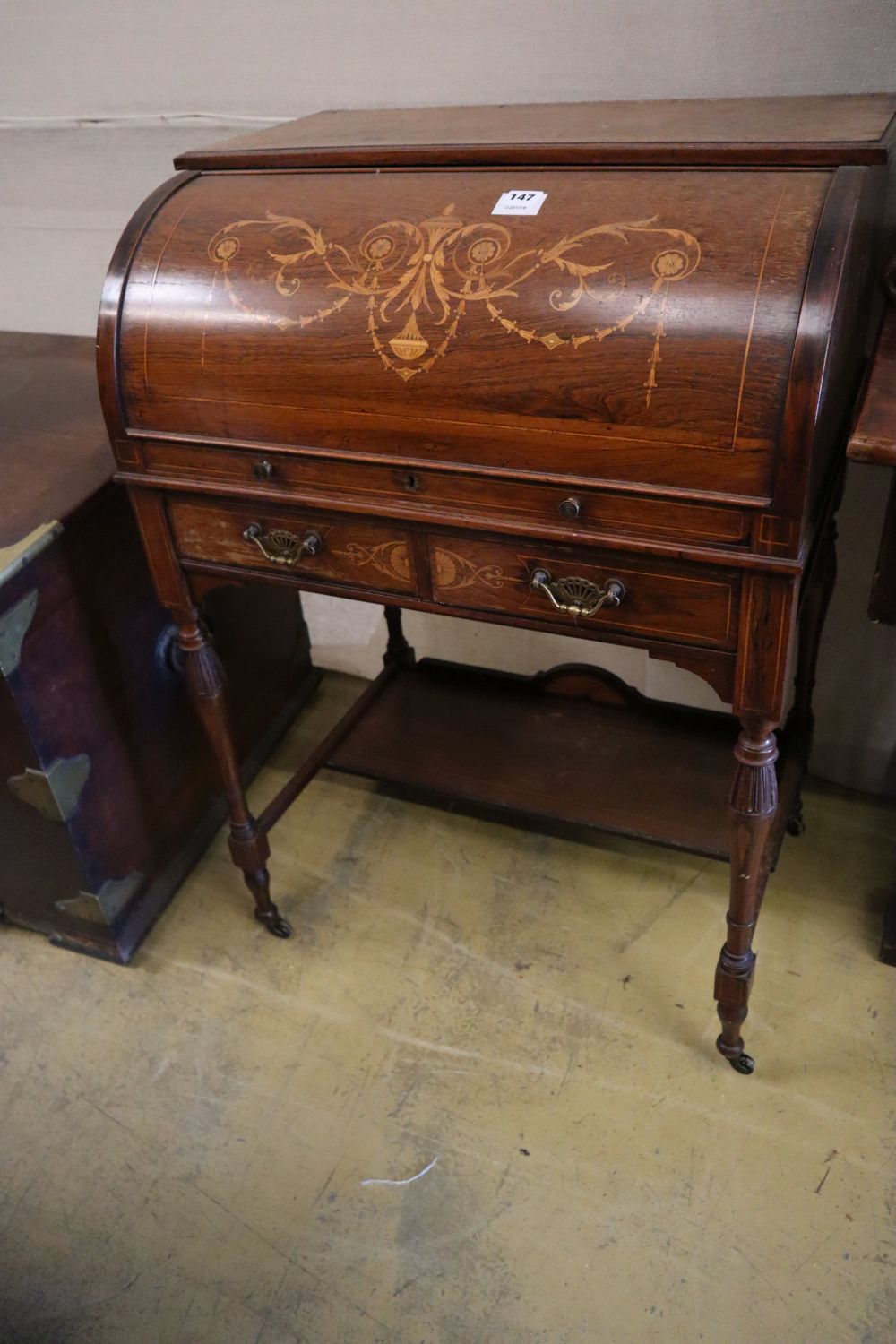 An Edwardian marquetry inlaid rosewood cylinder bureau, width 69cm